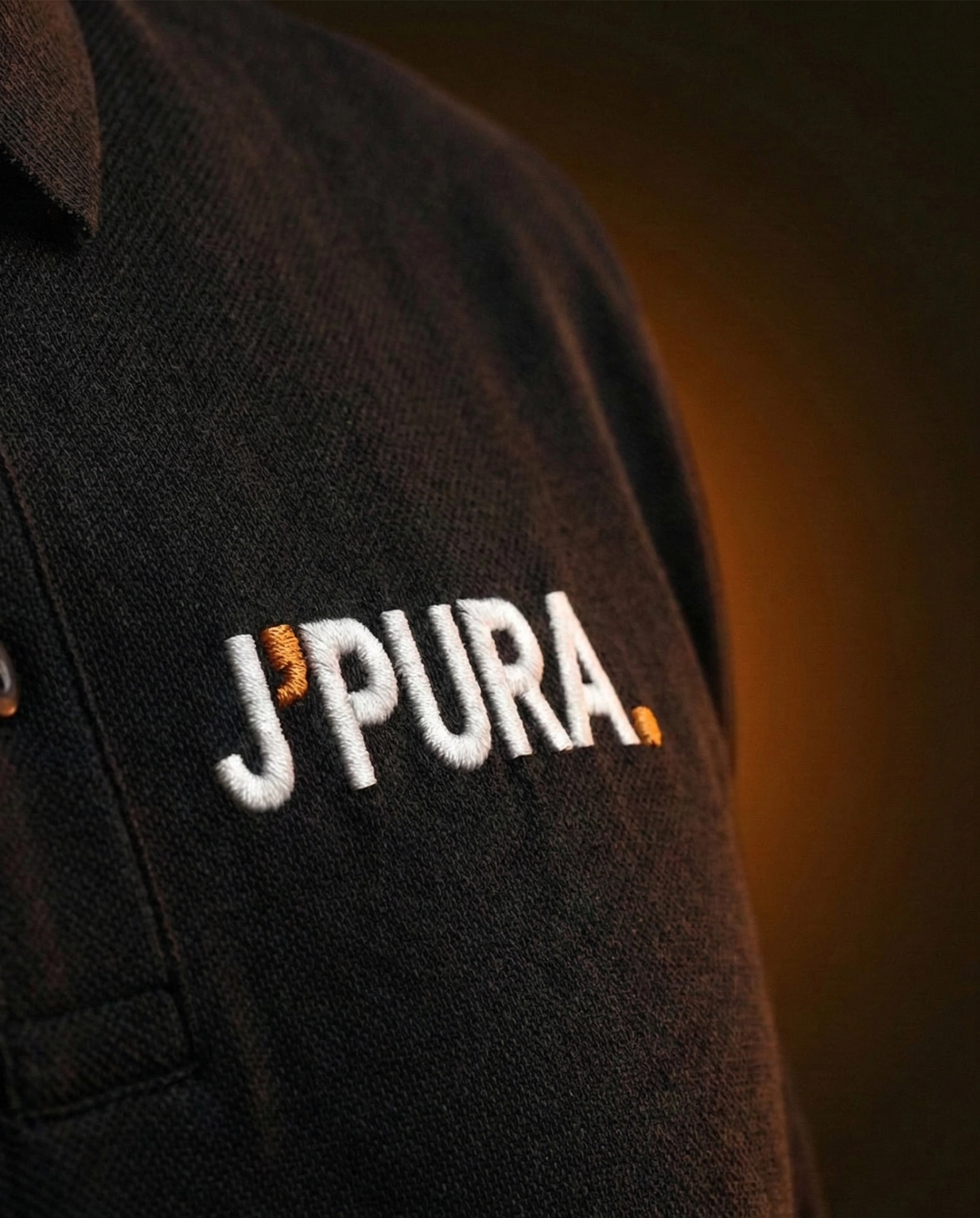Black J'PURA embroidered polo with orange trim, front and back view – view 2